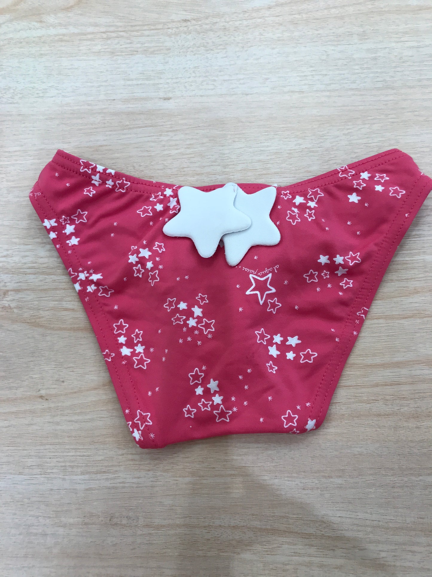 Costume Al Agua Patos fucsia con stelline piccole e grandi in rilievo
