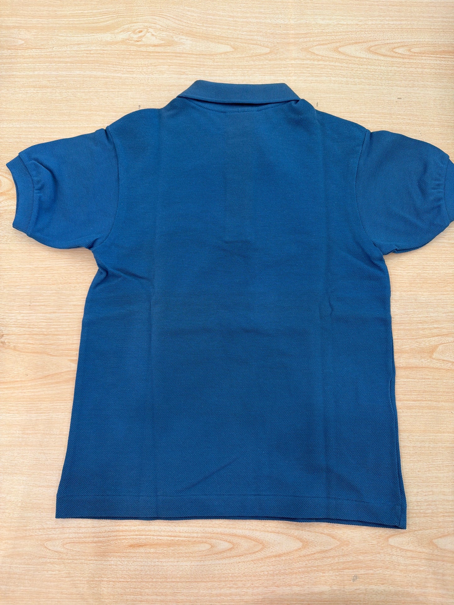 Polo Lacoste in cotone mezza manica con bottoncini e logo ricamato lateralmente unisex