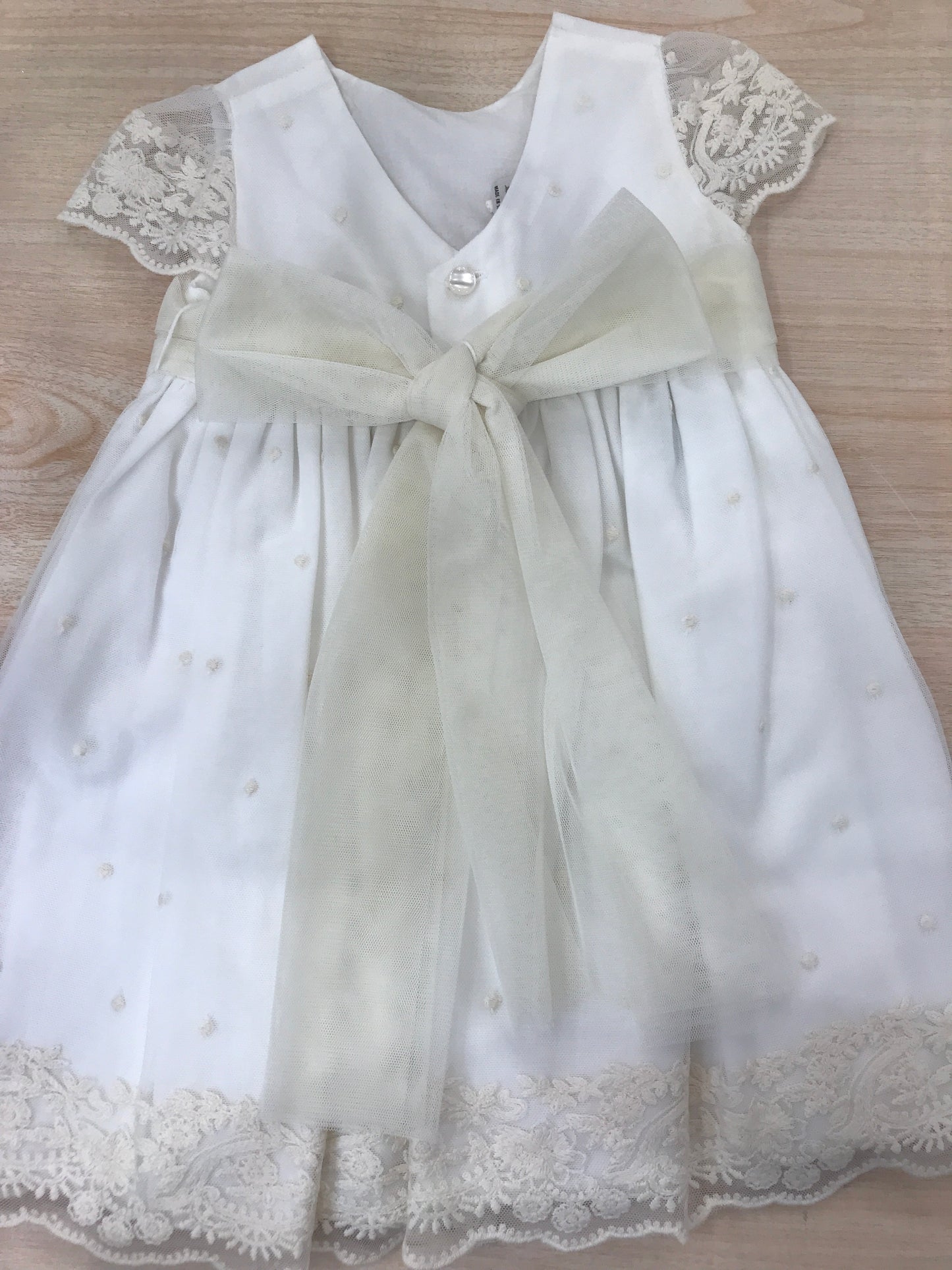 Abito Paz Rodriguez in cotone con strato in tulle smanicato con rusche rifinito in pizzo con fascia in vita con fiore