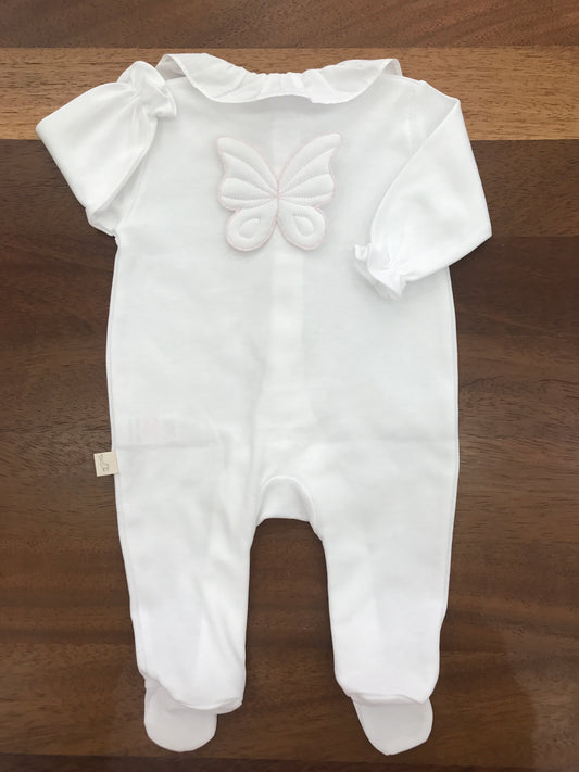 Tutina Baby Gi in cotone con piedini manica lunga con collo con rusche bianca sul retro applicata una farfalla