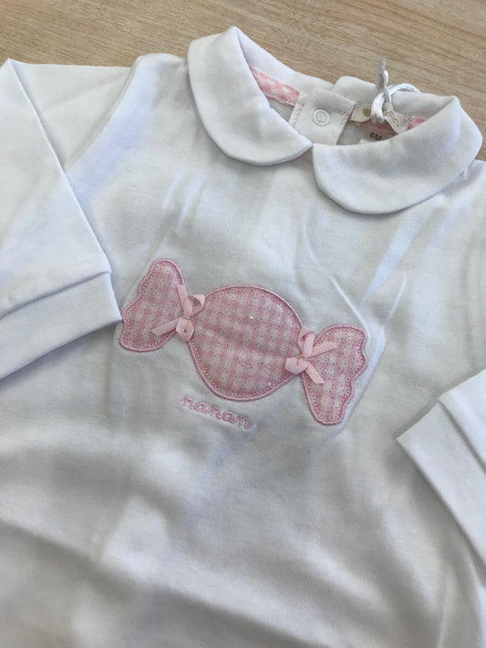 Tutina Nanan in cotone manica lunga con piedini con caramella rosa applicata sul davanti