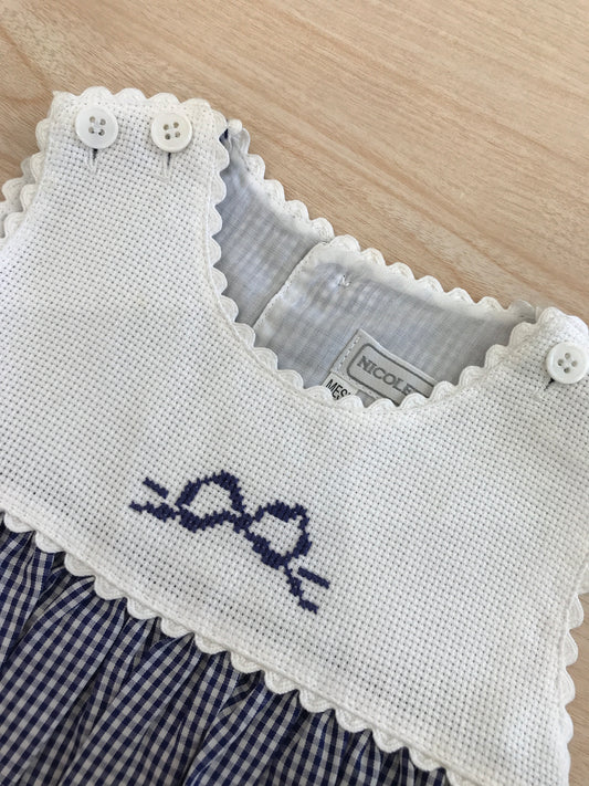 Abito Nicoletta Fanna in cotone a quadretti bianchi e blu con corpetto bianco con fiocco smanicato