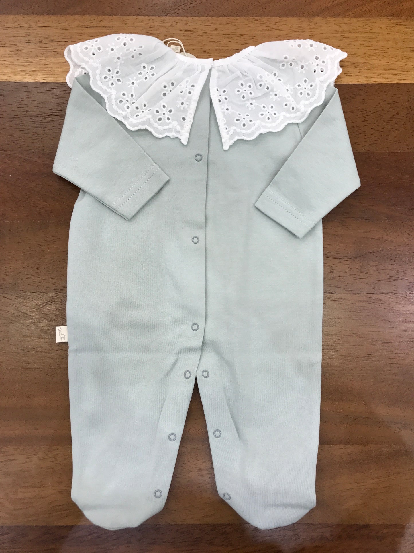 Tutina Baby Gi in cotone verde menta manica lunga gamba lunga con collo con rusche in san gallo