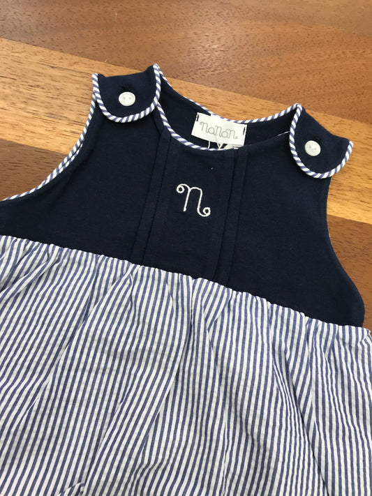 Pagliaccetto Nanan in cotone corpetto blu scuro il sotto a righe bianche e blu