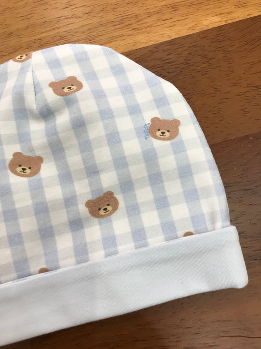Cappello Nanan in cotone con risvolto a quadretti bianchi e celesti con orsetti