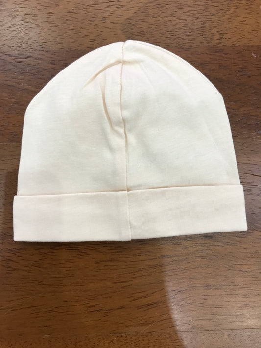 Cappello Nanan in cotone beige con risvolto e fiocchetto sul davanti