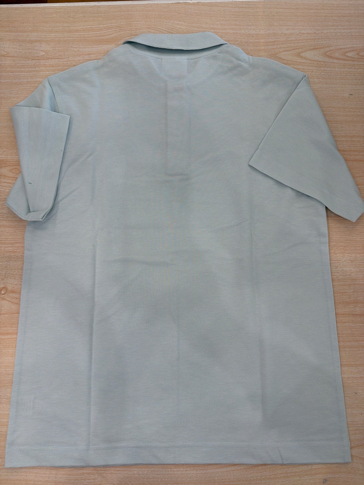 Polo Lacoste in cotone mezza manica con bottoncini e logo ricamato lateralmente unisex