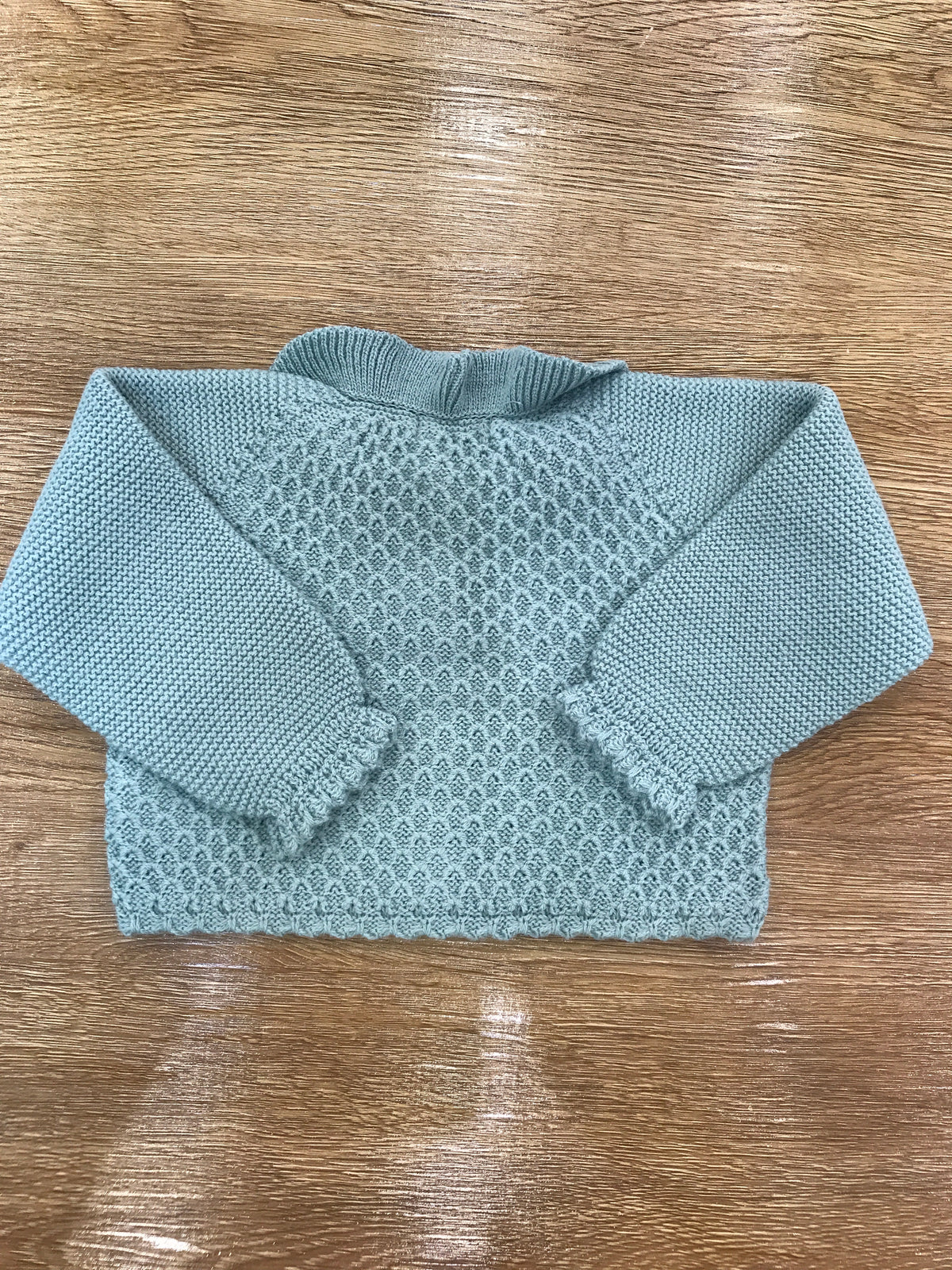 Cardigan PCS verde con collo con rusche e riccetto sul polsino