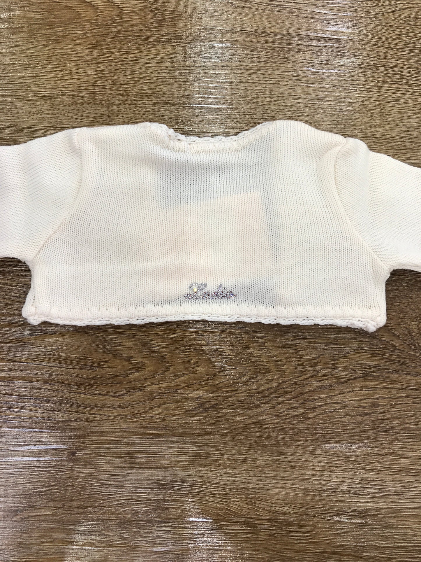 Cardigan Ladia in lana panna con applicazione di brillantini e fiocchetti