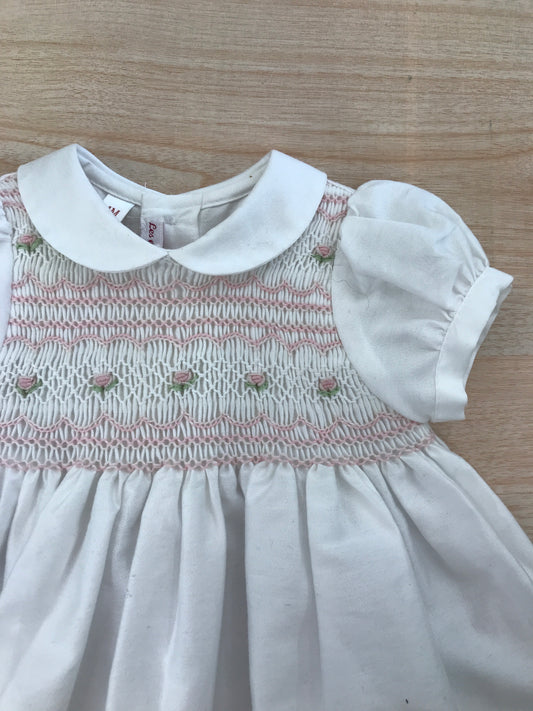 Abito Les Enfants de Gisele in cotone mella mezza manica a sbuffo con colletto tondo bianco con corpetto lavorato da punto smock rosa e verde con fiori ricamati