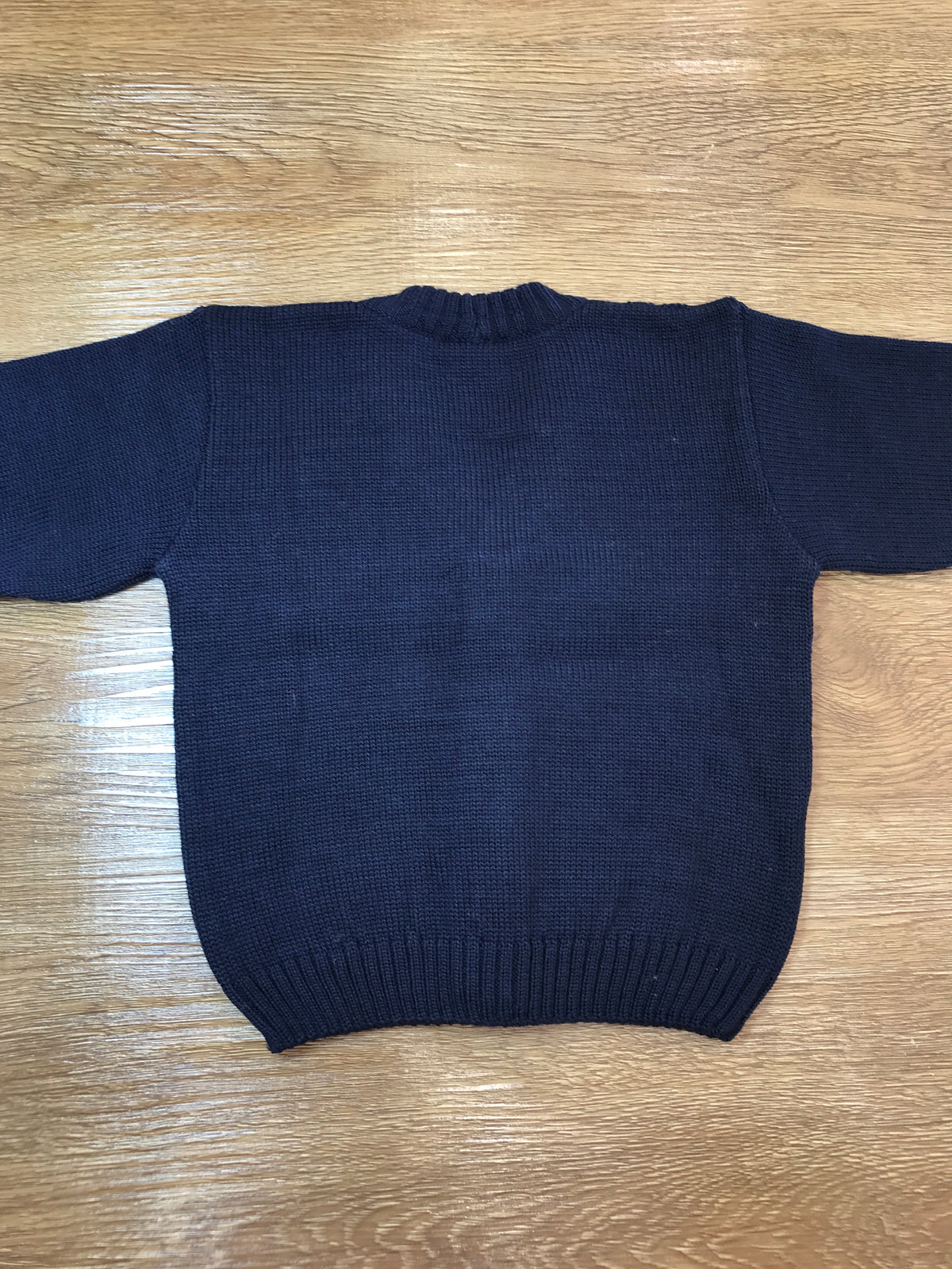 Cardigan Baby Lord in lana blu scuro con piccoli bottoncini sul davanti