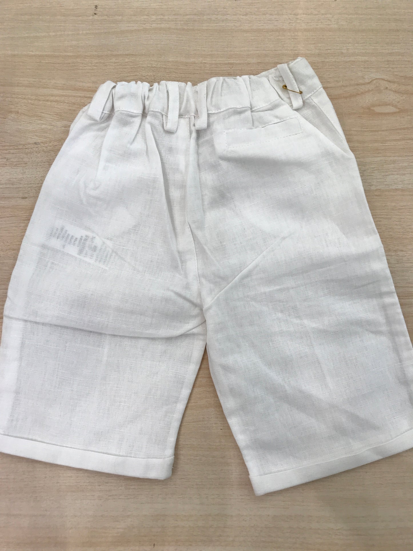 Pantalone Coccodè in lino bianco con tasche laterali con elastico in vita