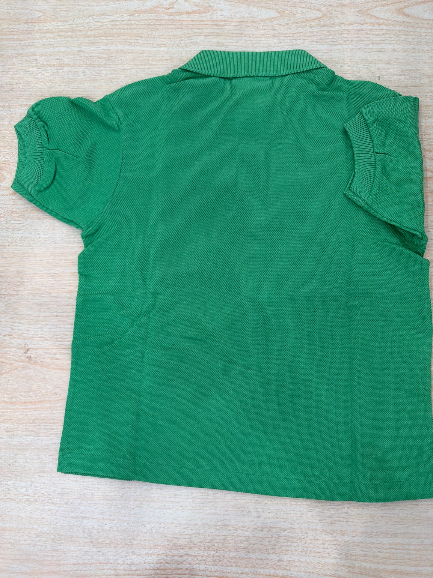 Polo Lacoste in cotone mezza manica con bottoncini e logo ricamato lateralmente unisex