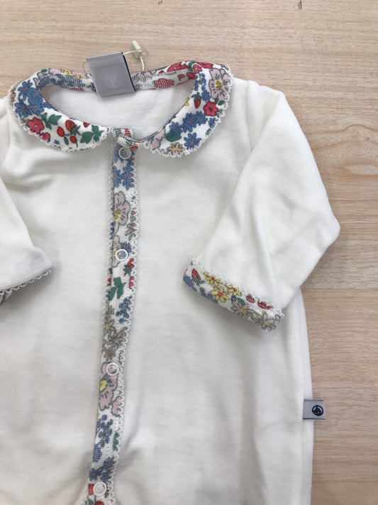 Tutina Petit Bateau in ciniglia bianca intera con piedini decorazione colorata floreale