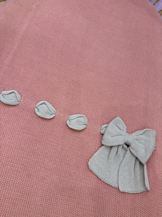 Coperta Baby Lord corallo con passanastro e fiocco tortora