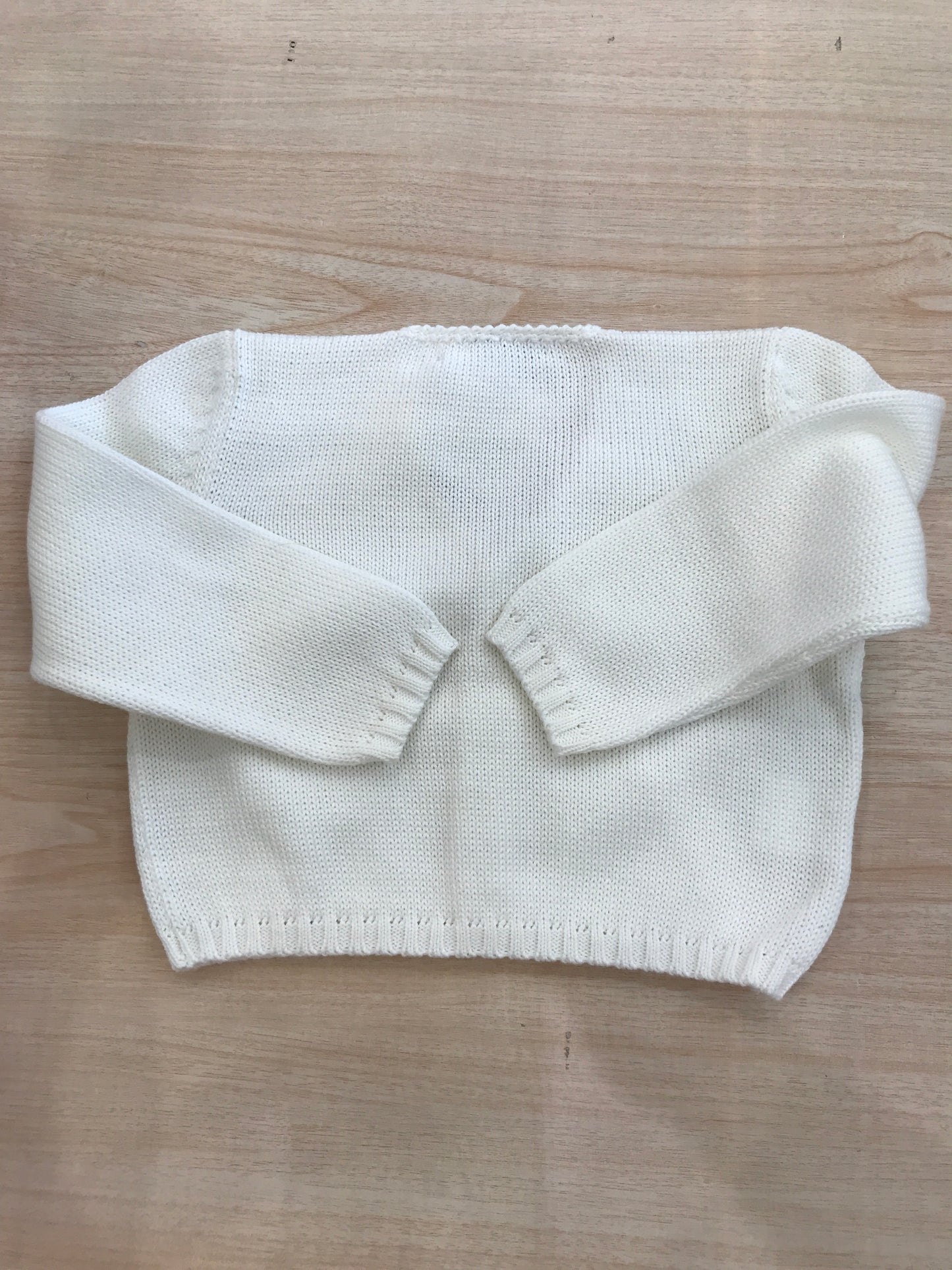 Cardigan Colibrì in filo panna con piccoli bottoncini sul davanti