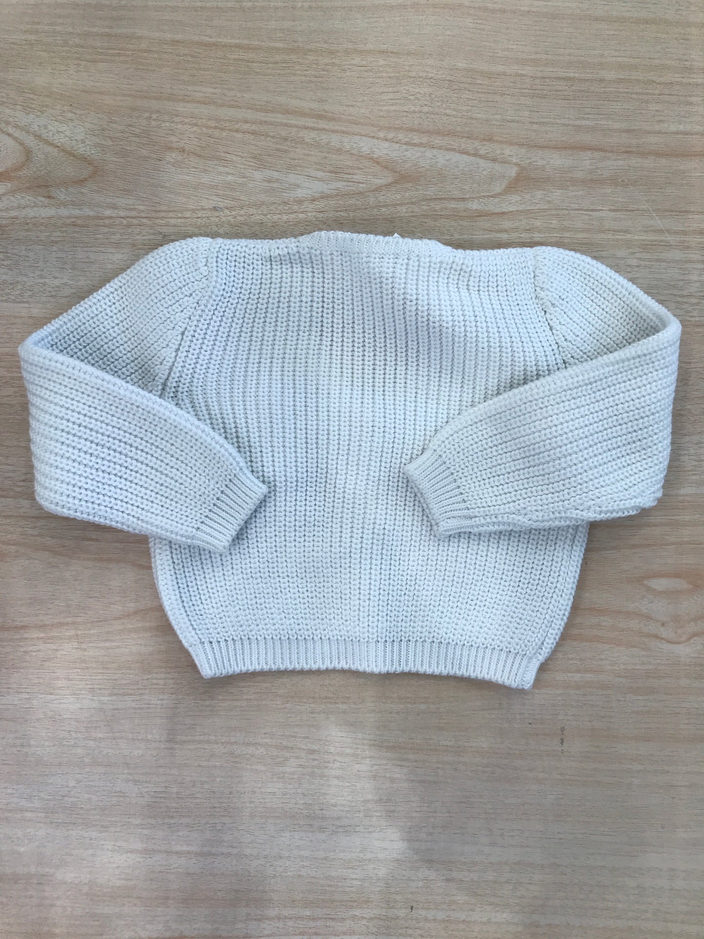 Cardigan Colibrì in filo manica lunga con bottoncini blu e taschino con pochette
