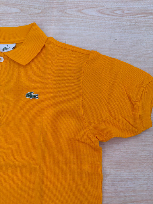 Polo Lacoste in cotone mezza manica con bottoncini e logo ricamato lateralmente unisex