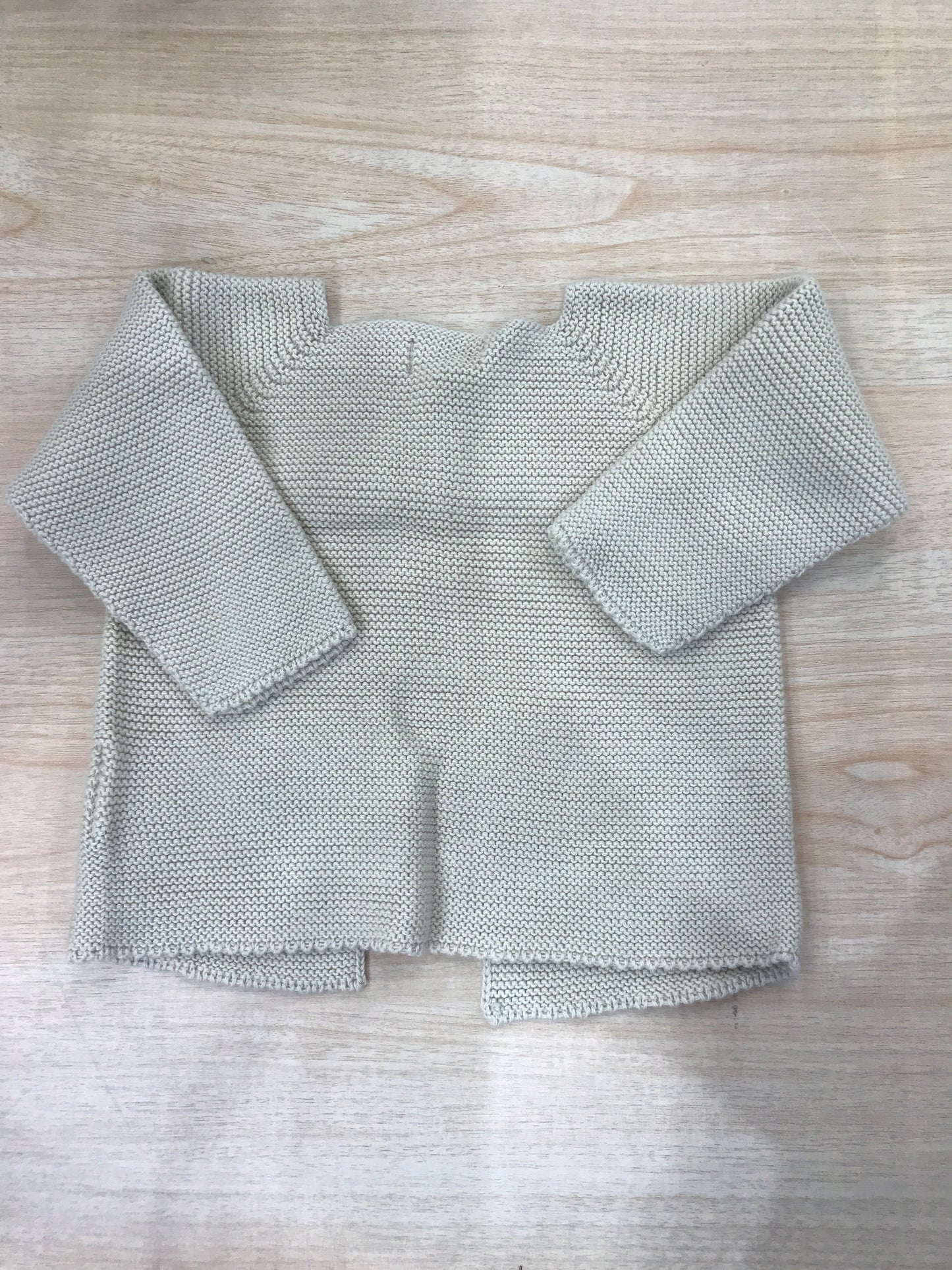 Cardigan PCS in filo con due bottoncini sul davanti