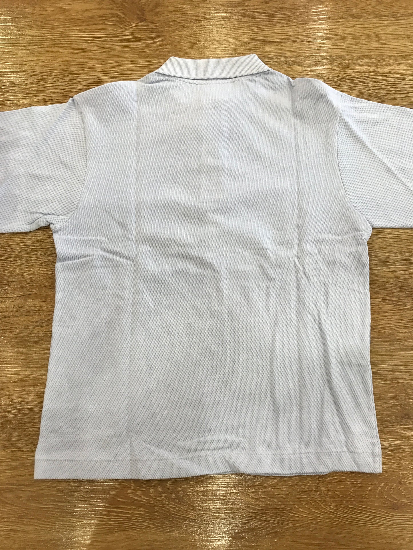 Polo Lacoste manica lunga con polsini e bottoncini