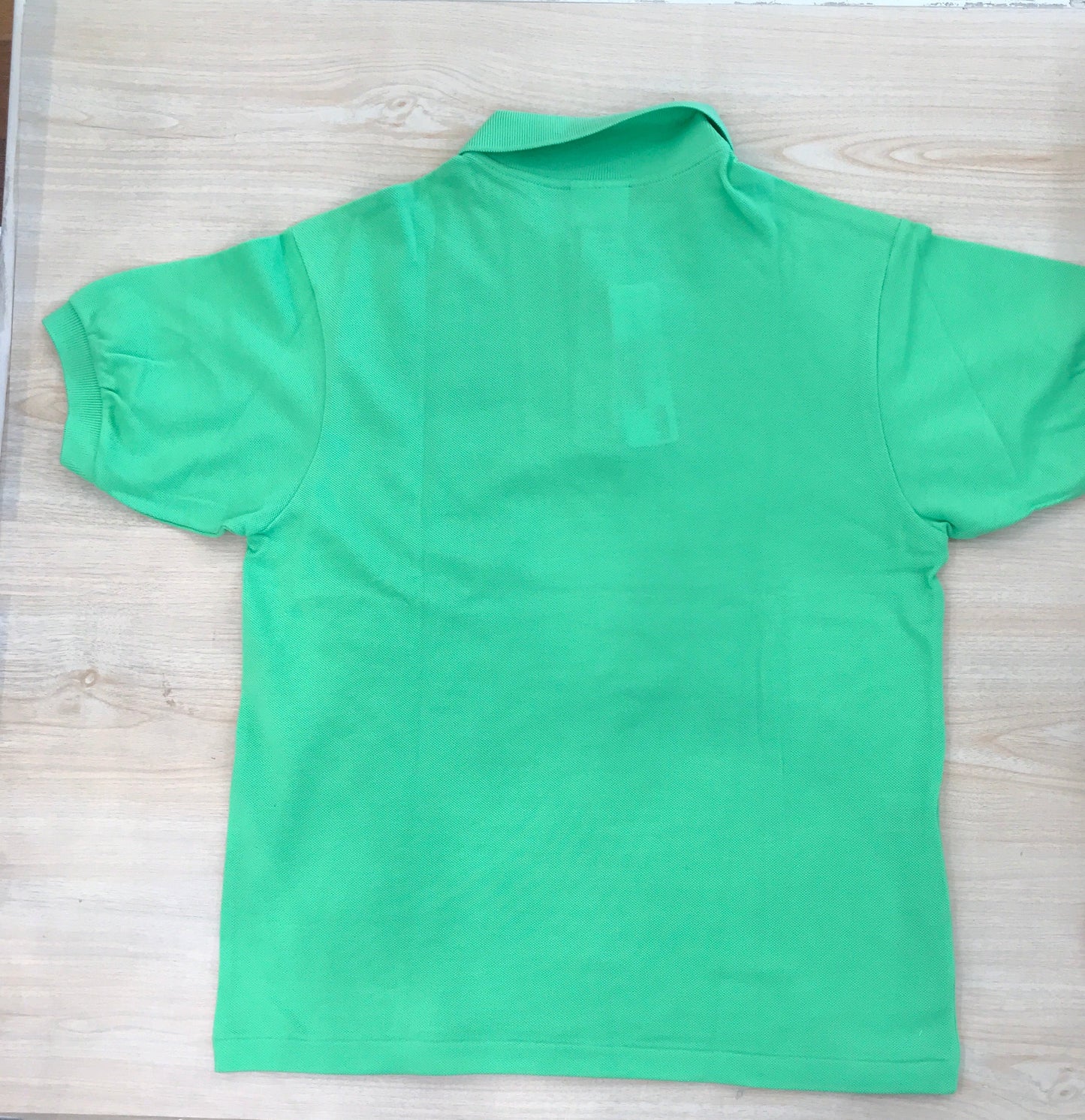 Polo Lacoste in cotone mezza manica con bottoncini e logo ricamato lateralmente unisex