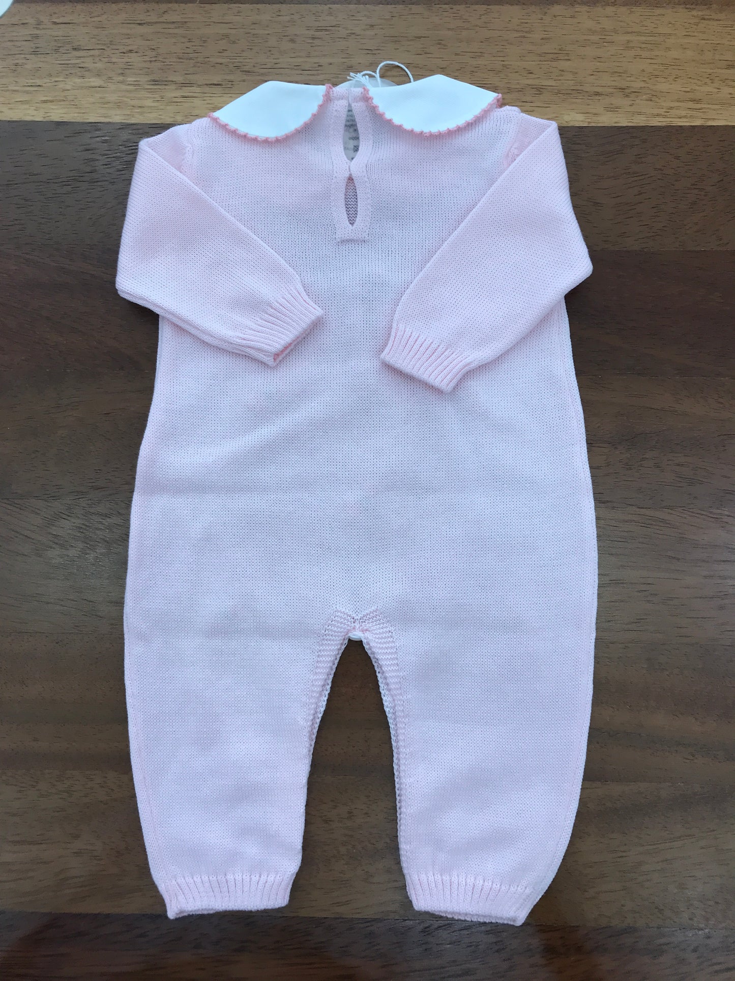 Tutina Baby Lord in filo rosa manica lunga con rose corallo ricamate sul davanti