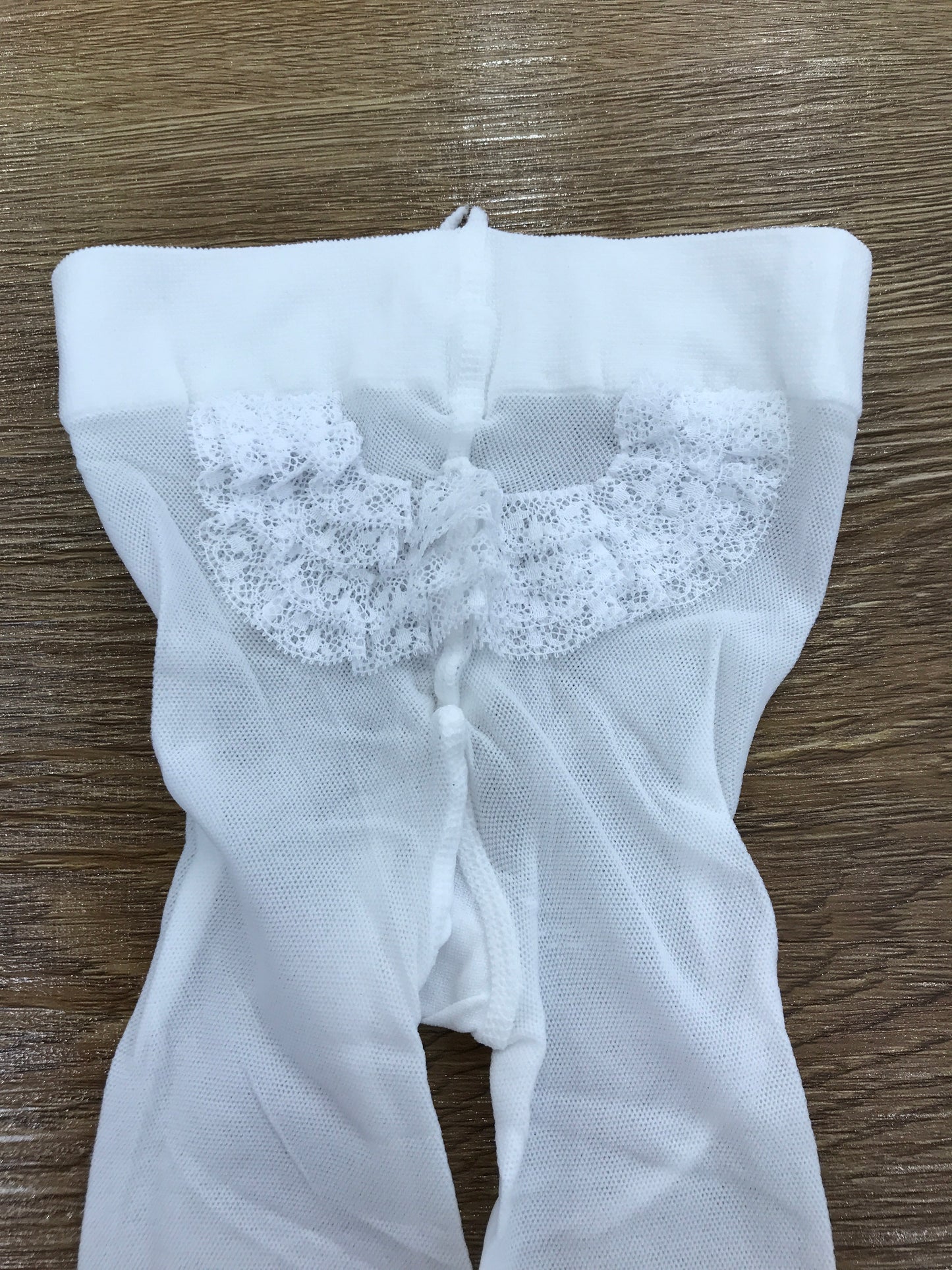Calze Story Loris in microrete bianche con rusche sul retro
