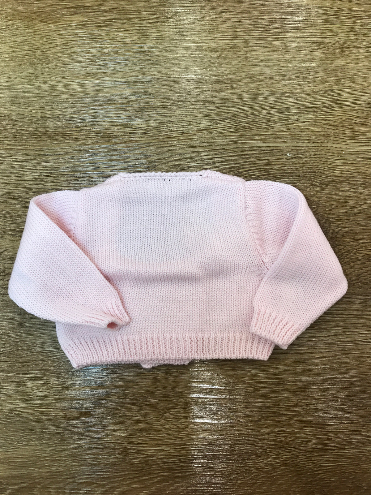 Cardigan Le Dodò in lana rosa con lavorazione di trecce e chiusura doppiopetto