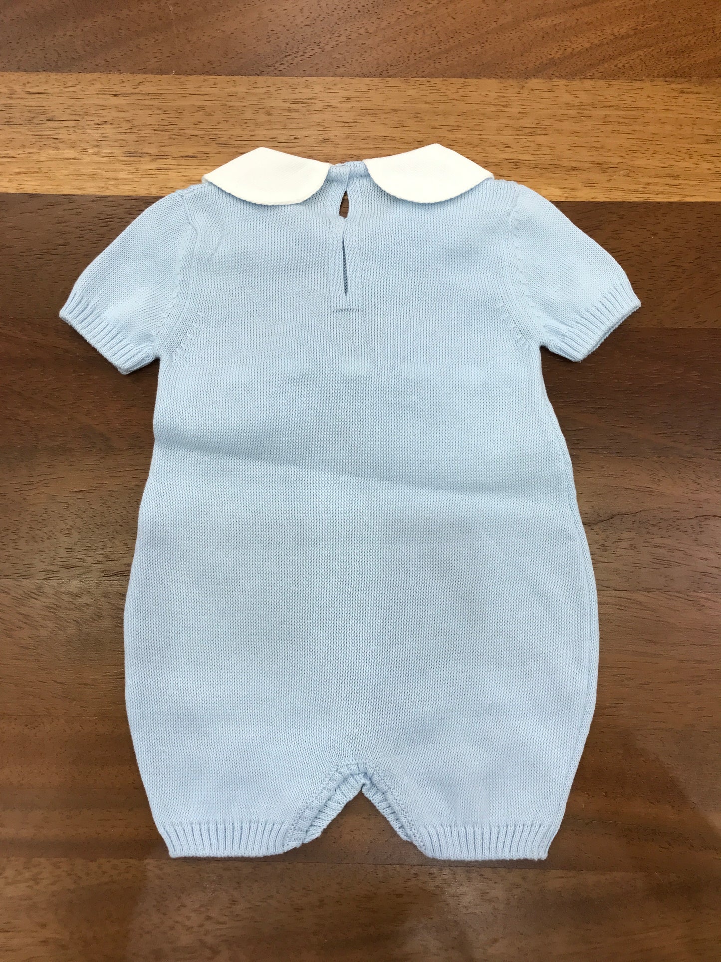 Pagliaccetto Baby Lord in filo mezza manica collo tondo bianco con fiocco passanastro bianco