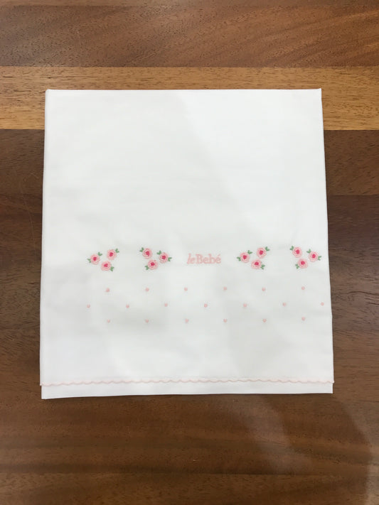 Lenzuolino Le Bebè con fiori ricamati rosa e pois