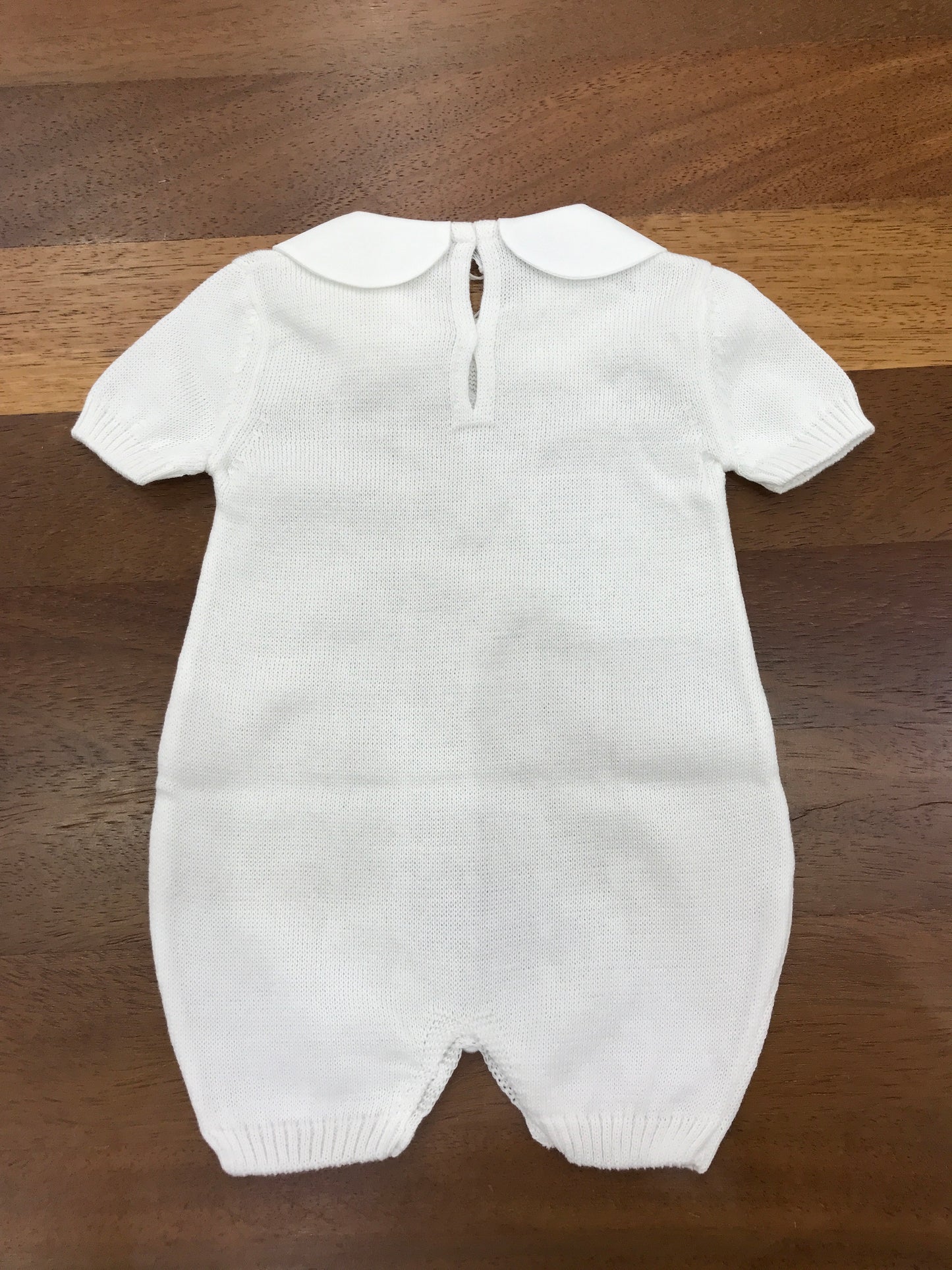 Pagliaccetto Baby Lord mezza manica con lavorazione di trecce sul davanti