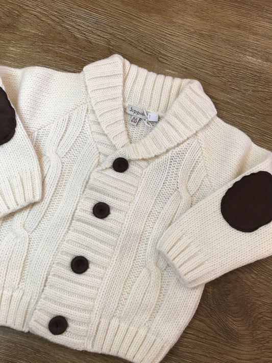 Cardigan Juppolà panna con lavorazione di trecce e bottoncini marroni