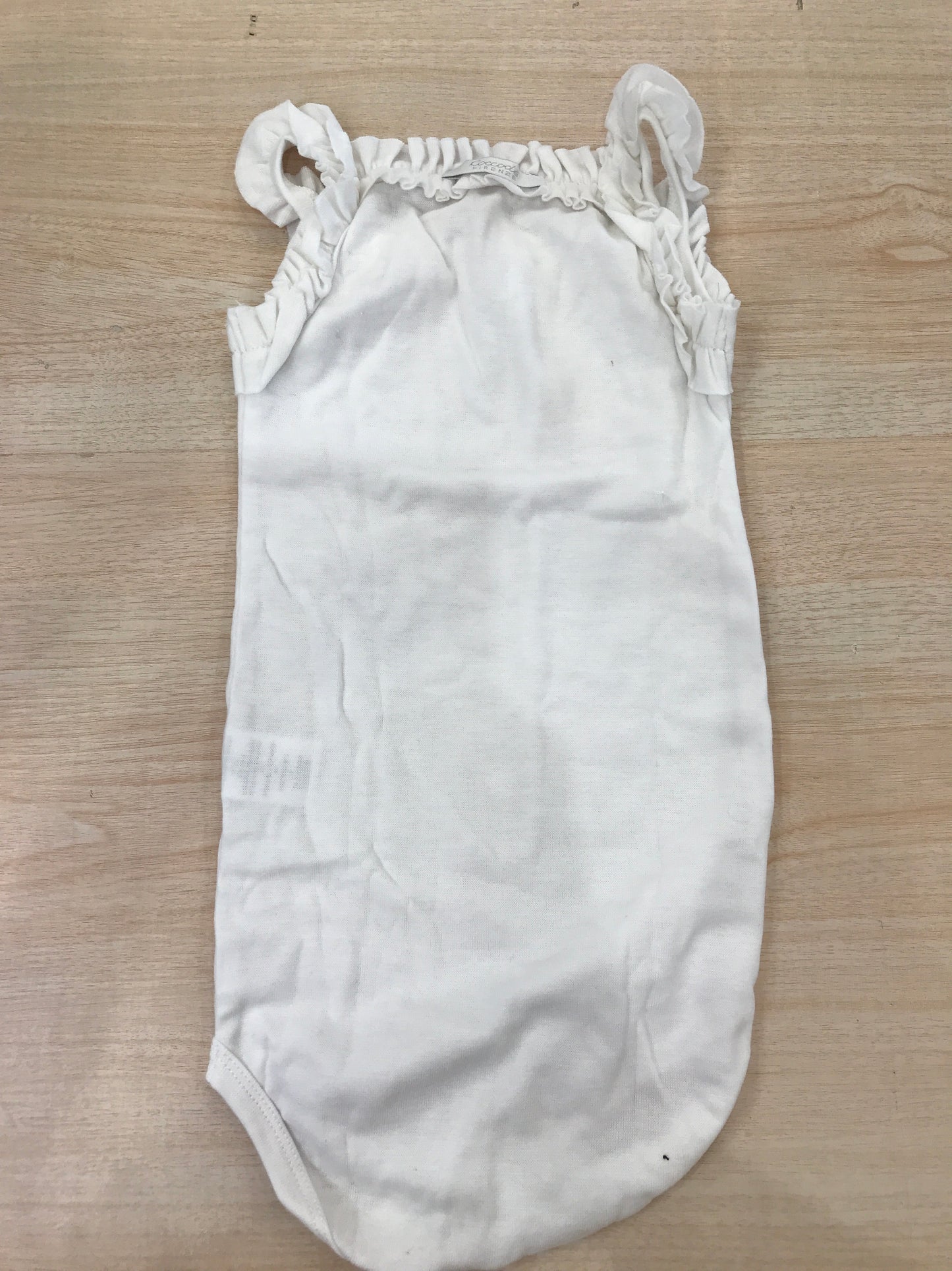Body Coccodè bianco in cotone a spallina con rusche con disegno applicato sul davanti