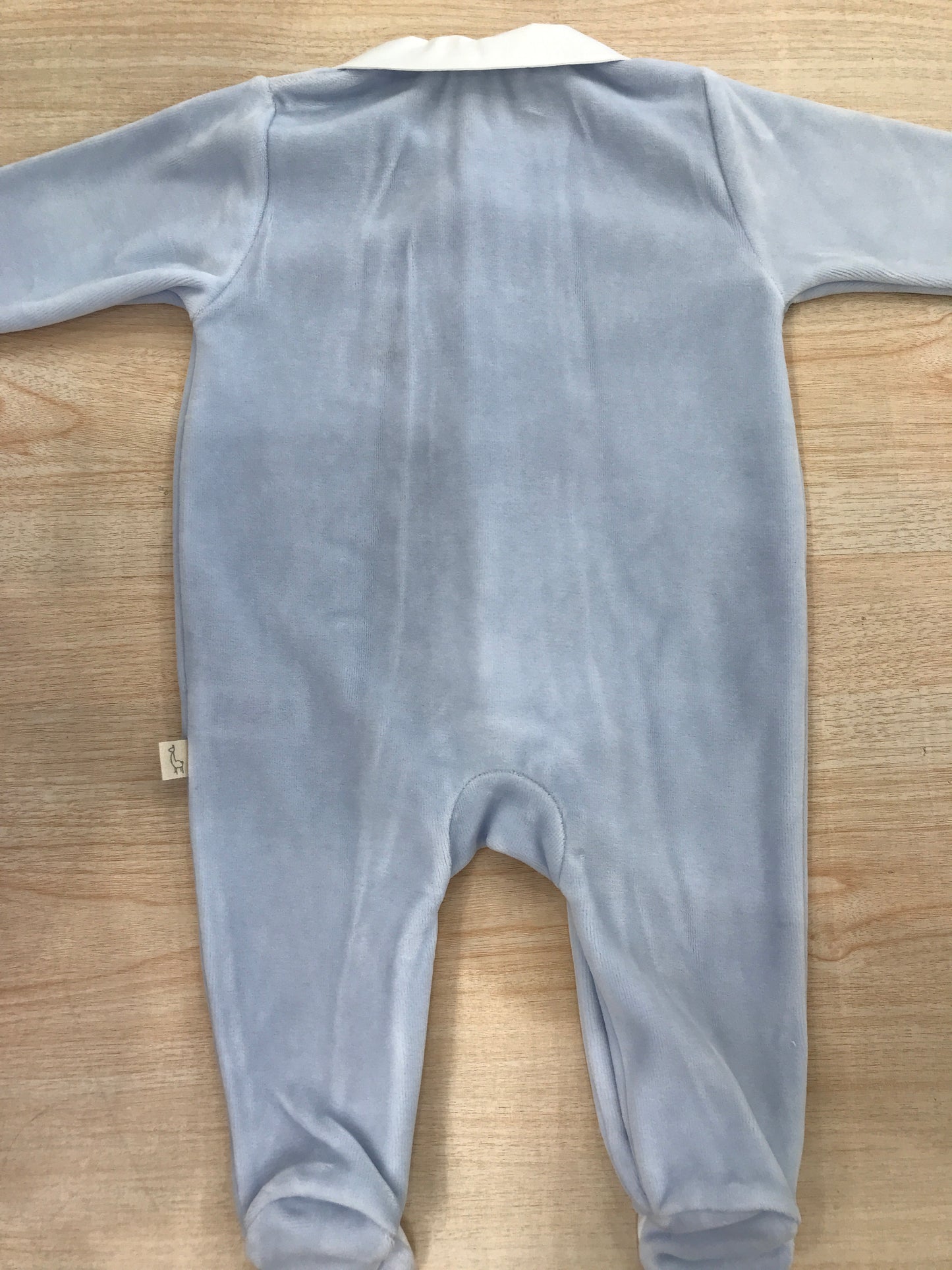 Tutina Baby Gi in ciniglia celeste polvere intera con dettaglio bianco sul davanti e colletto bianco