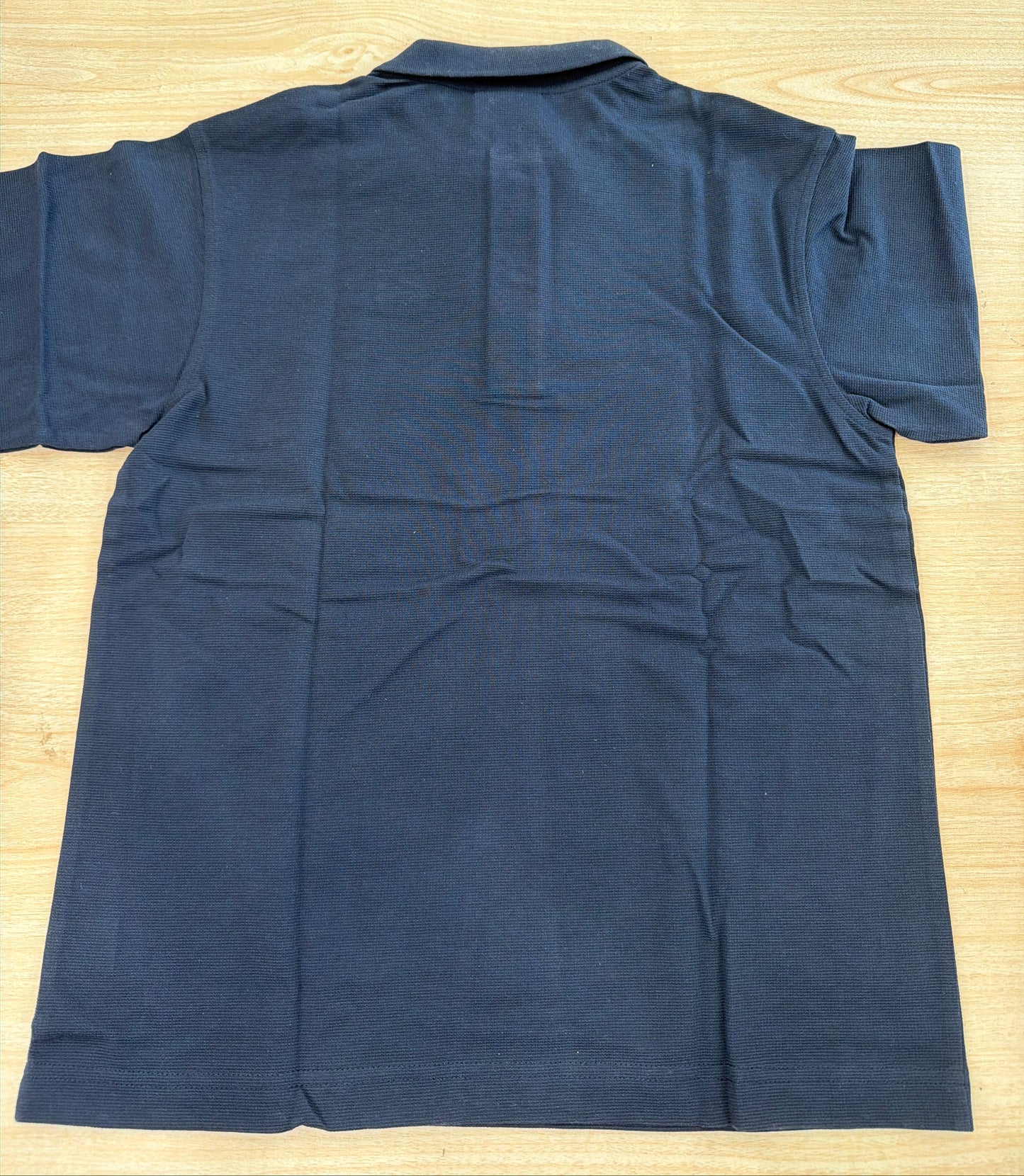 Polo Lacoste in cotone mezza manica con bottoncini e logo ricamato lateralmente unisex