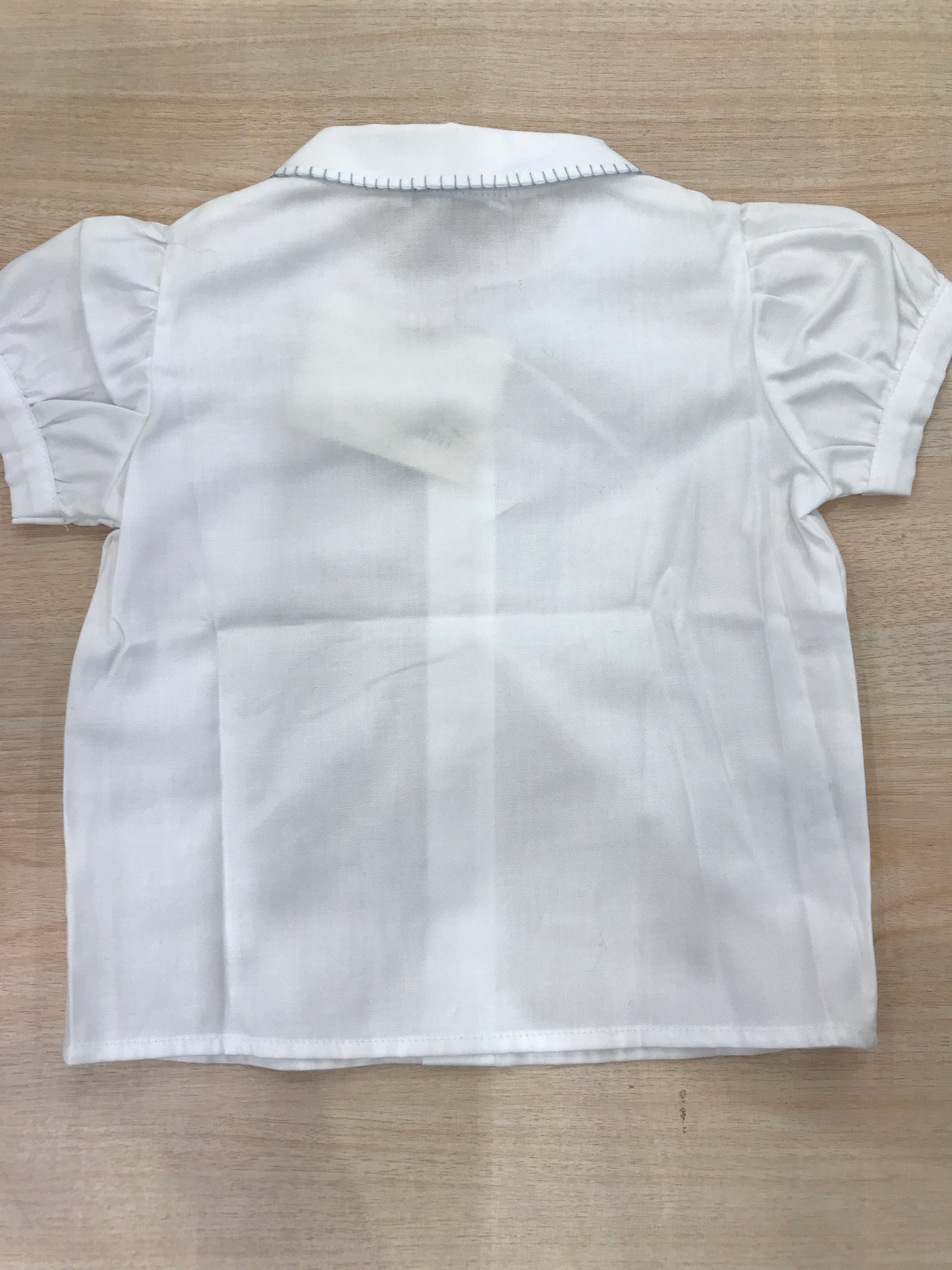 Camicia Colibrì in cotone mezza manica a sbuffo con colletto rifinito in celeste