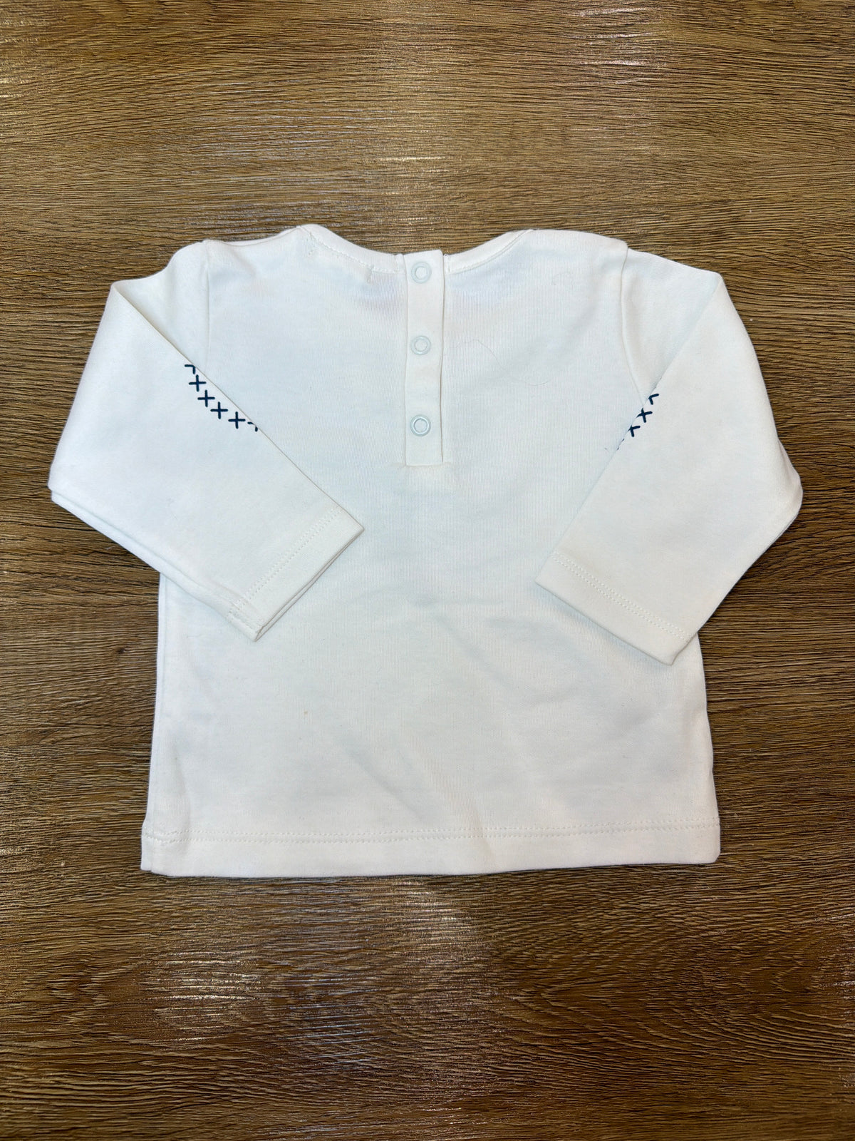 Tuta Coccodè due pezzi pantalone con bretelle blu scuro e t-shirt bianca manica lunga