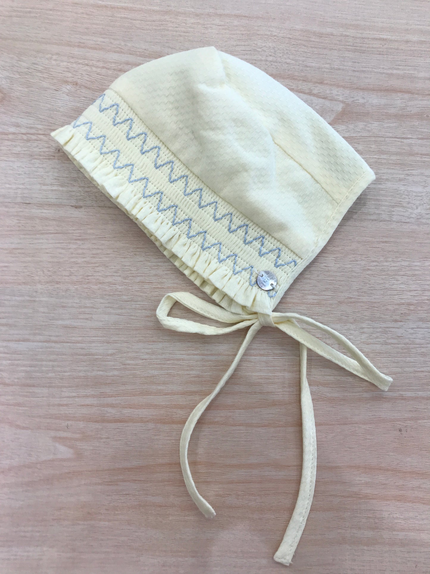 Cuffia Paz Rodriguez in cotone con lavorazione di punto smock