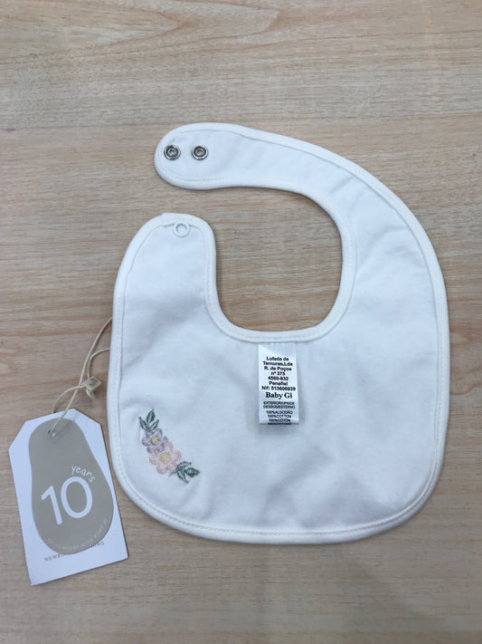 Bavetta Baby Gi in cotone rifinito in ciniglia panna con fiore ricamato