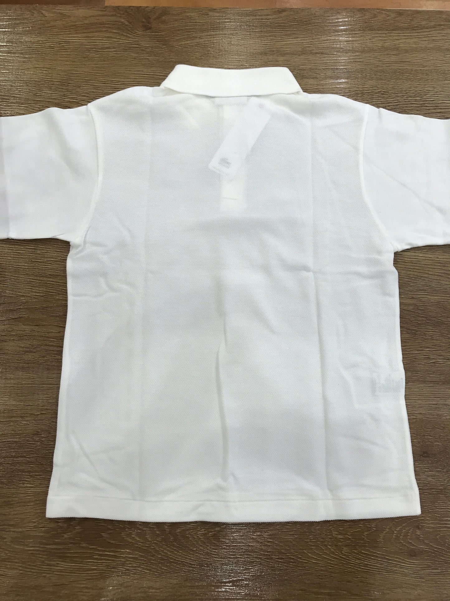Polo Lacoste manica lunga con polsini e bottoncini