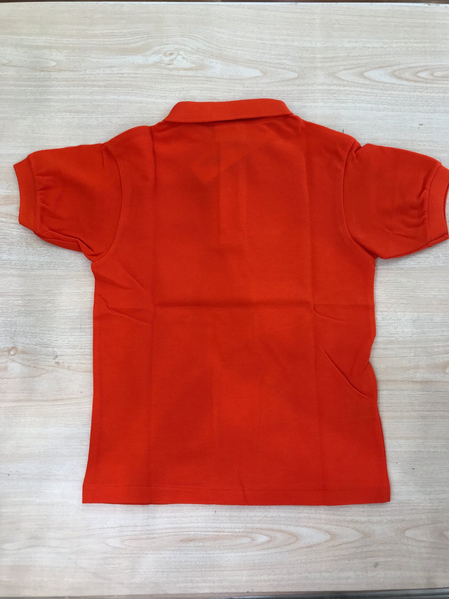 Polo Lacoste in cotone mezza manica con bottoncini e logo ricamato lateralmente unisex