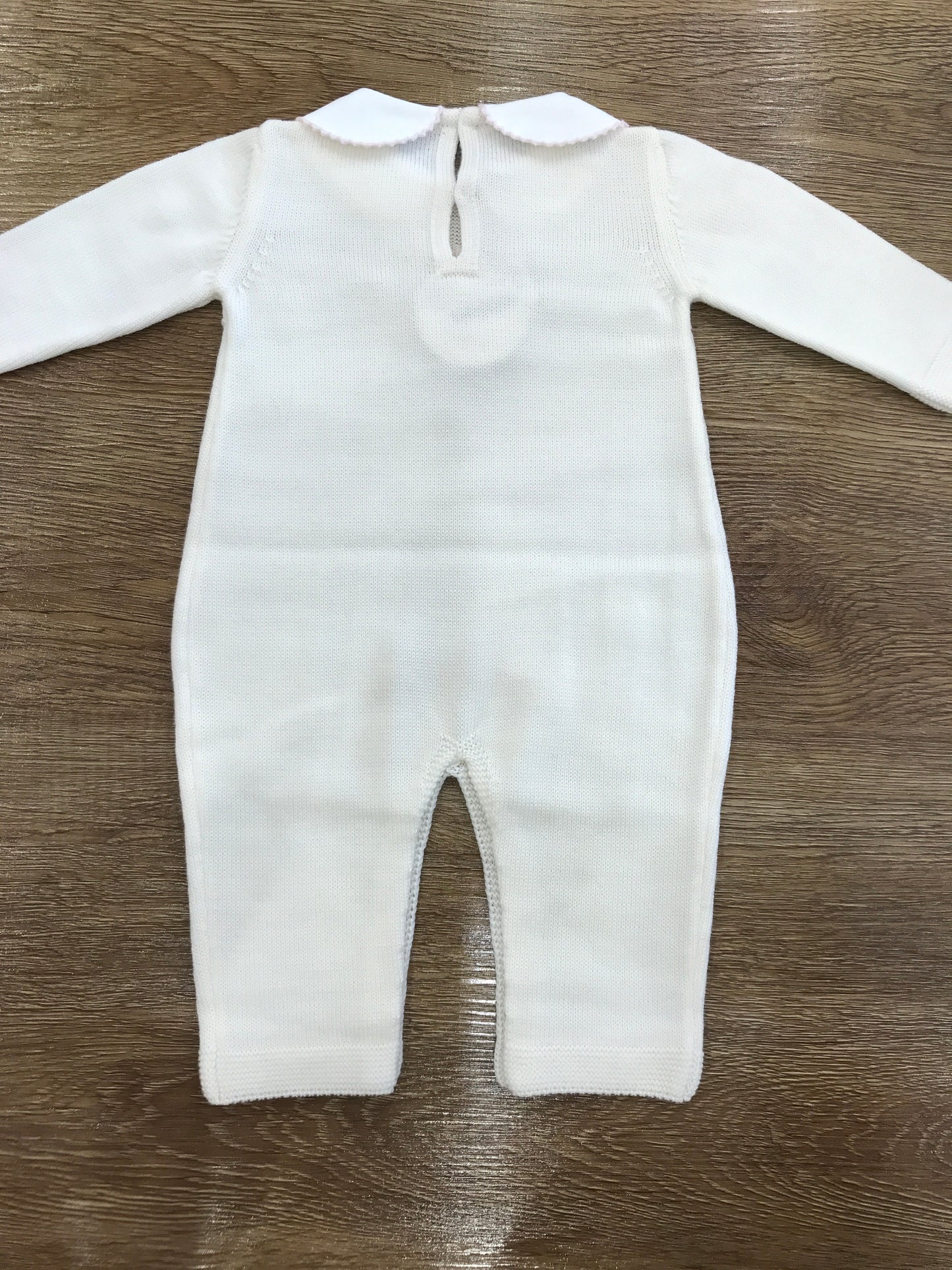 Tutina Baby Lord in lana panna intera con roselline rosa e fiocchetto sul corpetto