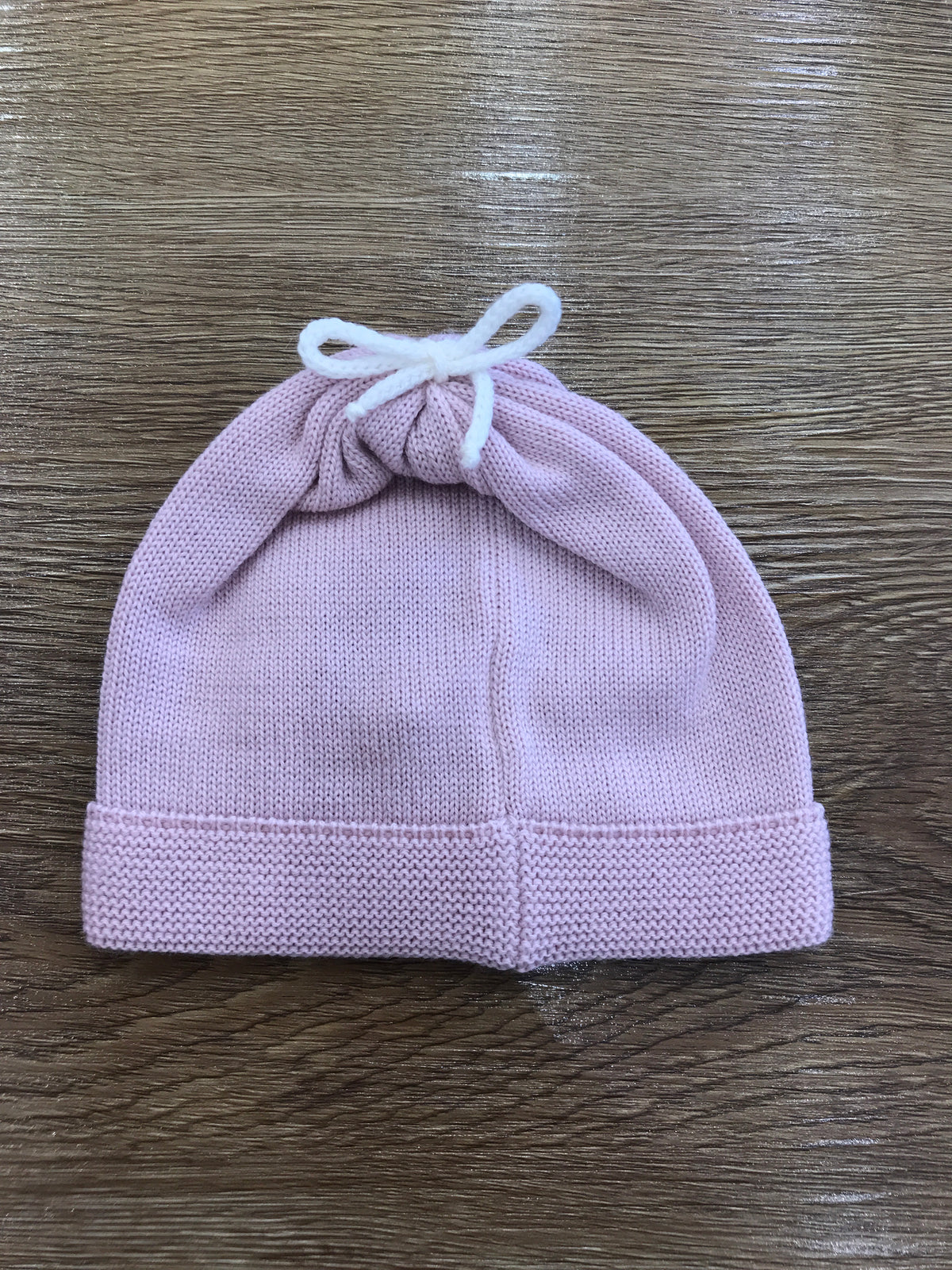 Cappello Baby Lord in lana rosa antico con fiocchetto
