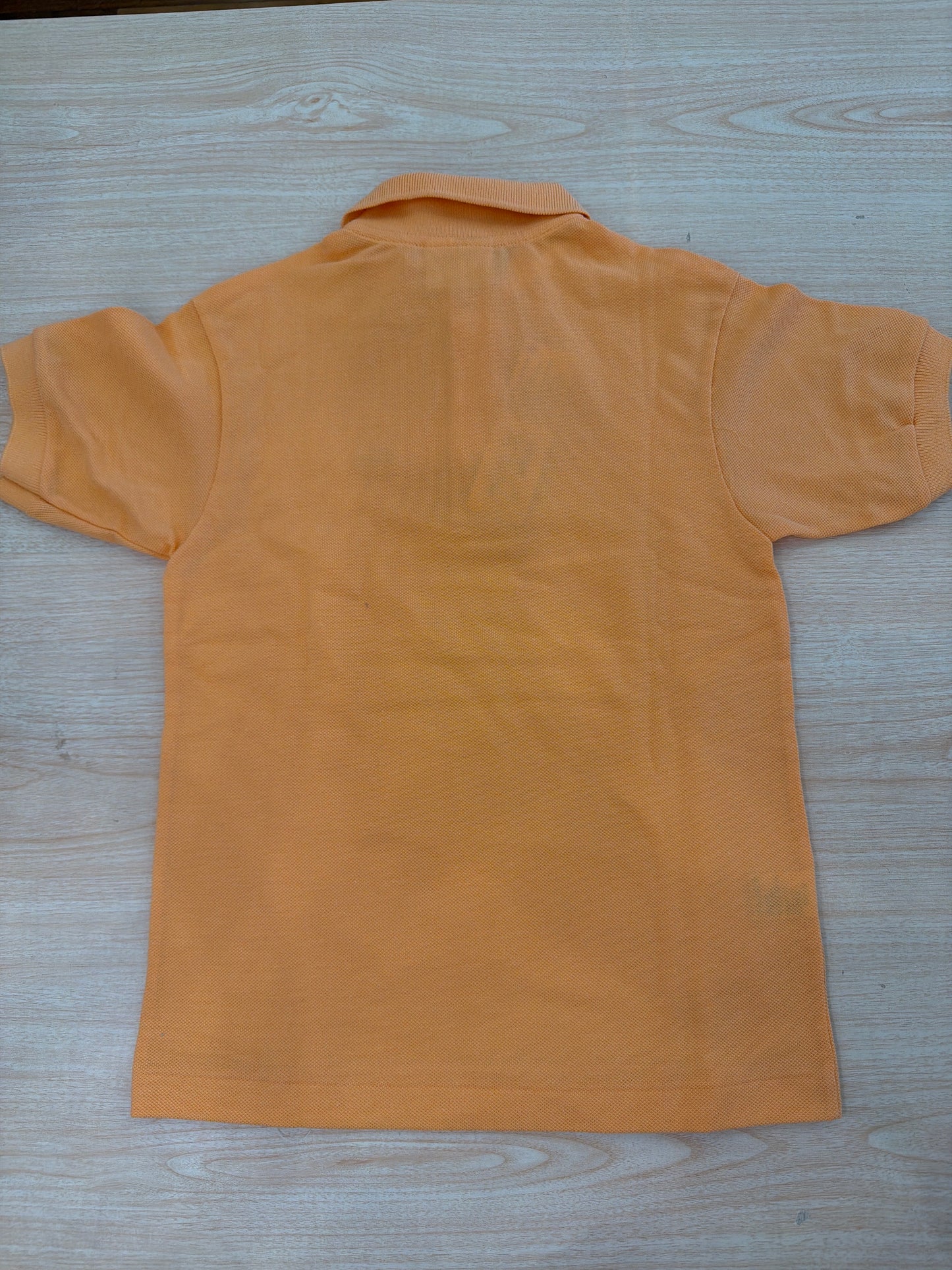 Polo Lacoste in cotone mezza manica con bottoncini e logo ricamato lateralmente unisex
