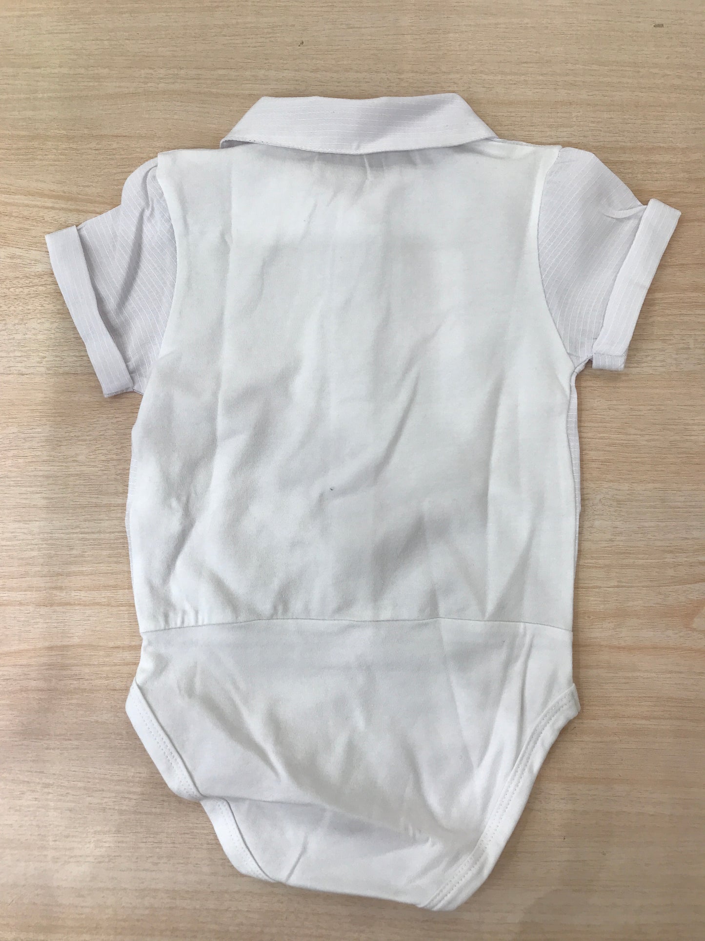 Body Coccodè in cotone mezza manica con colletto a punta con bottoncini sul davanti effetto camicia