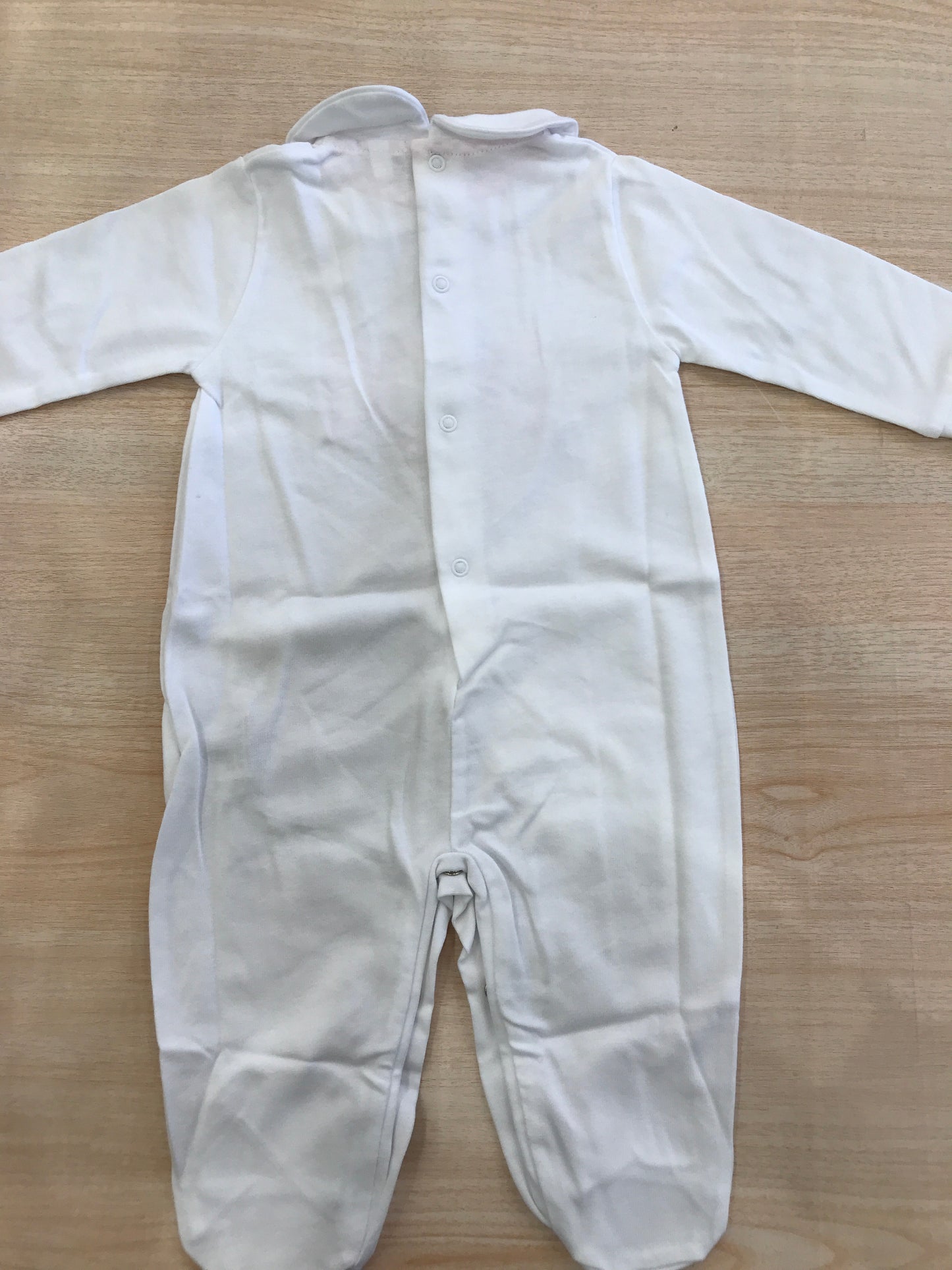 Tutina Nanan in cotone manica lunga con piedini con caramella rosa applicata sul davanti
