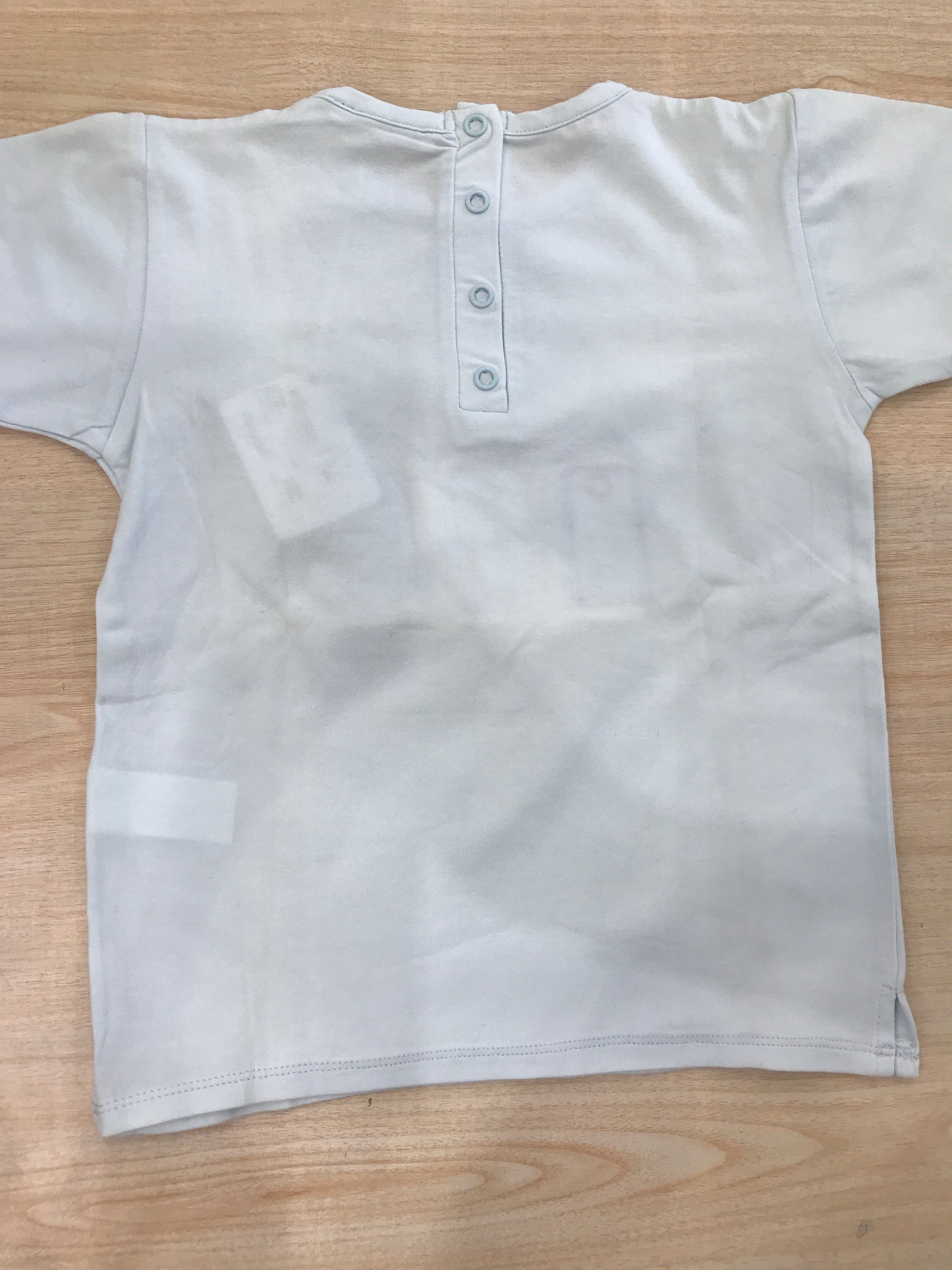 T-shirt Coccodèin cotone mezza manica celeste con disegni sul davanti