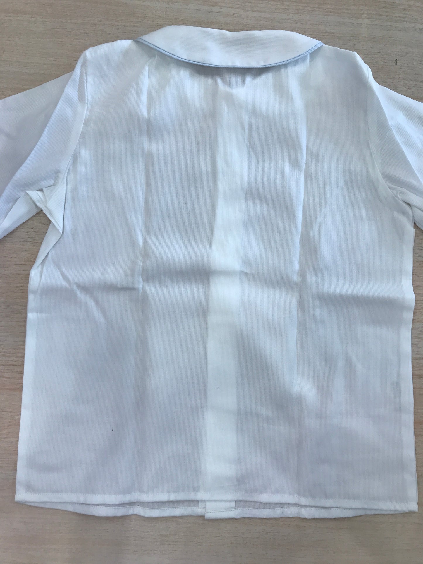 Camicia Nicoletta Fanna in cotone manica lunga con colletto rifinito in celeste e cavallo a dondolo