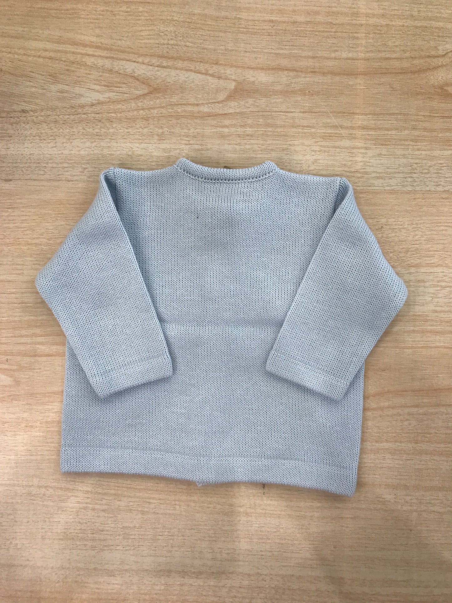 Cardigan Baby Lord in filo celeste con piccoli bottoncini