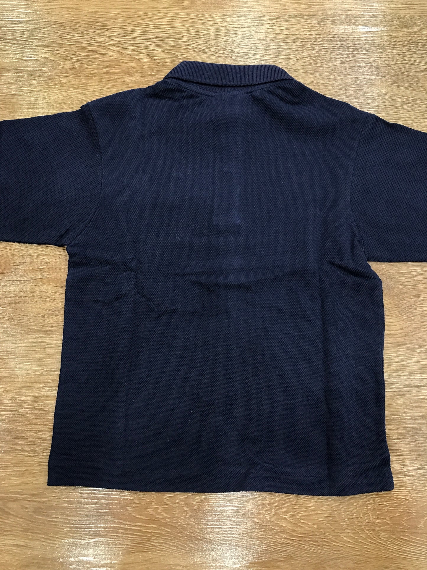Polo Lacoste manica lunga con polsini e bottoncini